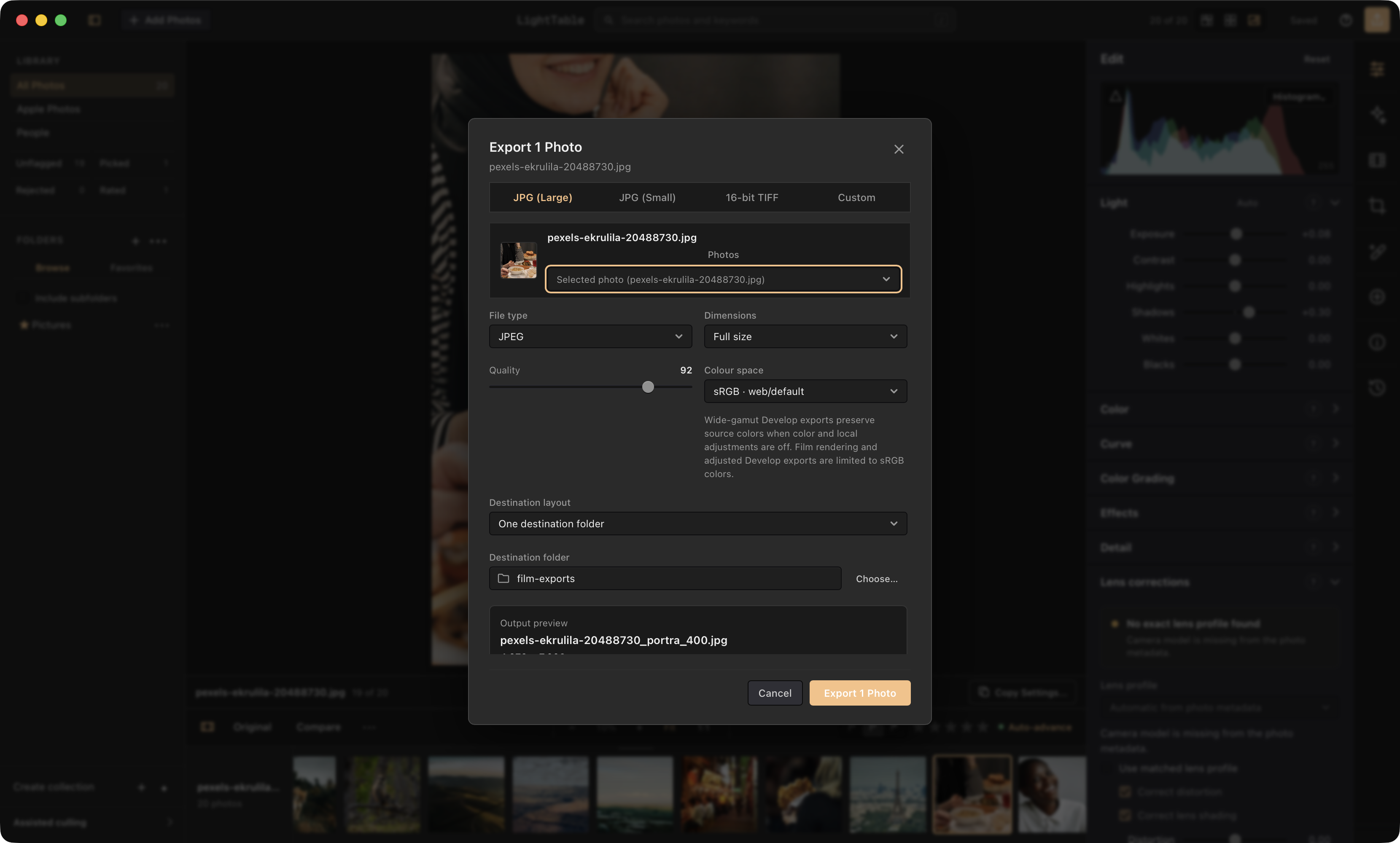 LightTable Full-resolution export showing a warmly lit meal at a table